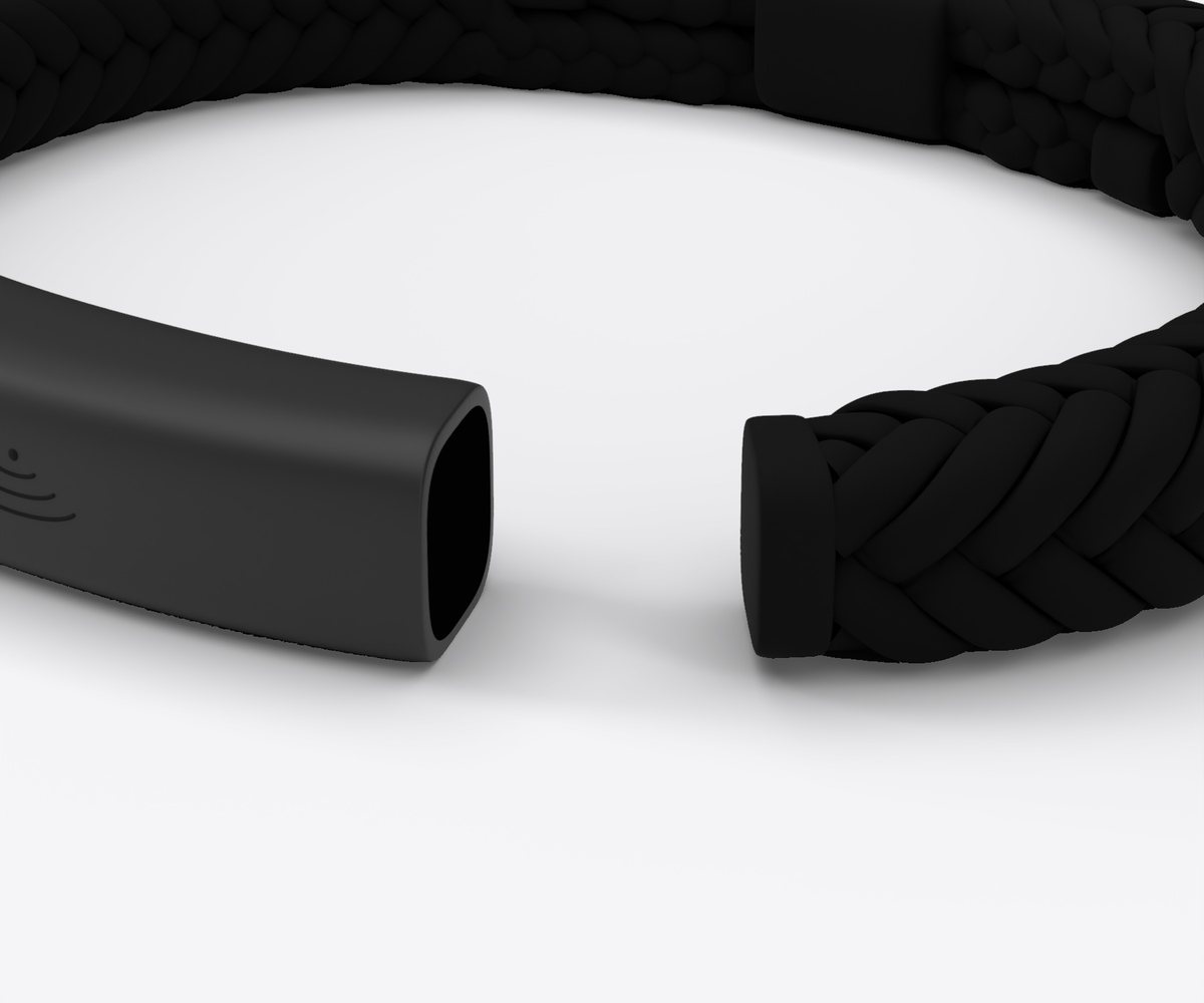 One end of the strap pulled out of the Core, showing the socket it clicks into